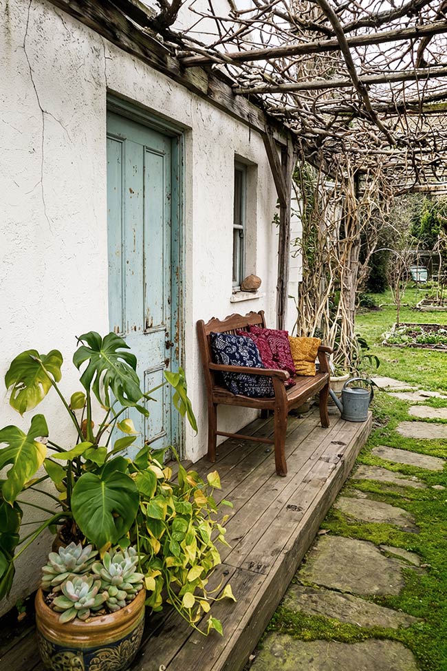 Rustic Charm with a Vintage Blue Front Door Porch