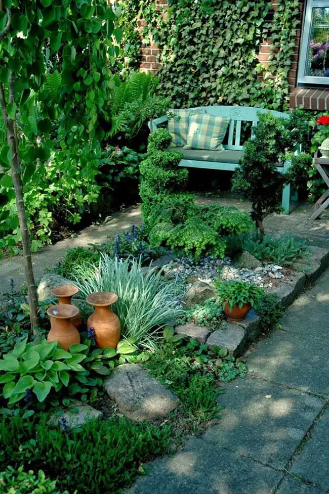 Cozy Blue Bench Nook in a Leafy Shade Garden